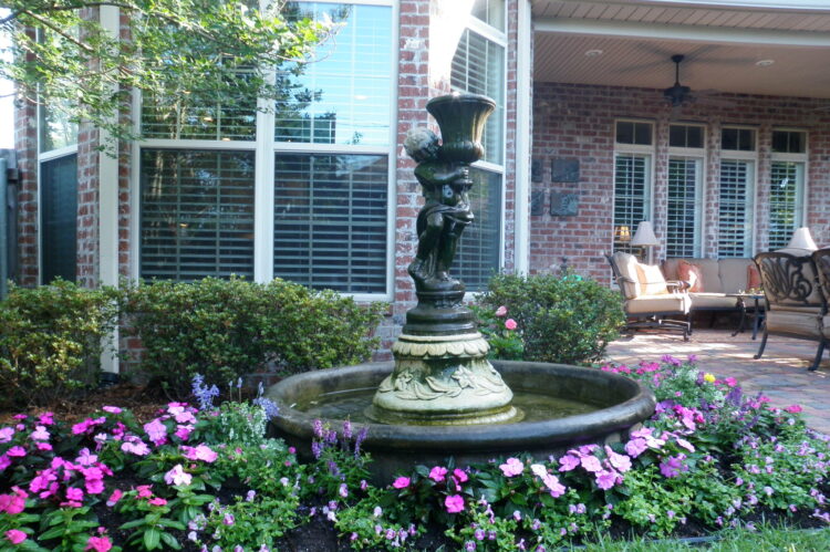 fountain in lush garden