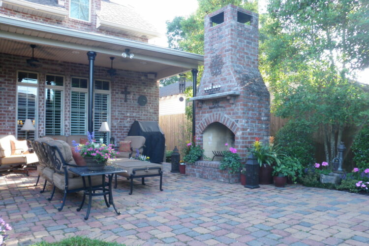 New Orleans style landscape with black wrought iron porch columns