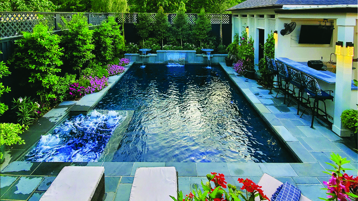 New Orleans backyard with pool & courtyard landscaping